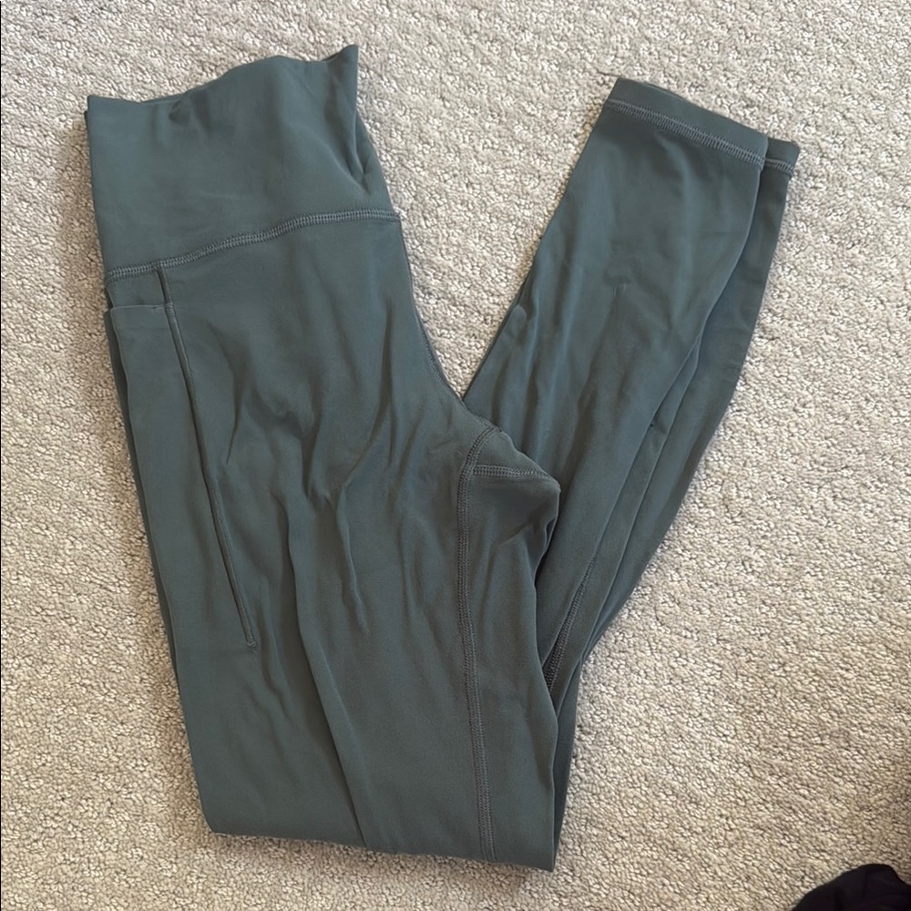 Athleta Green Transcend Stash Tights
